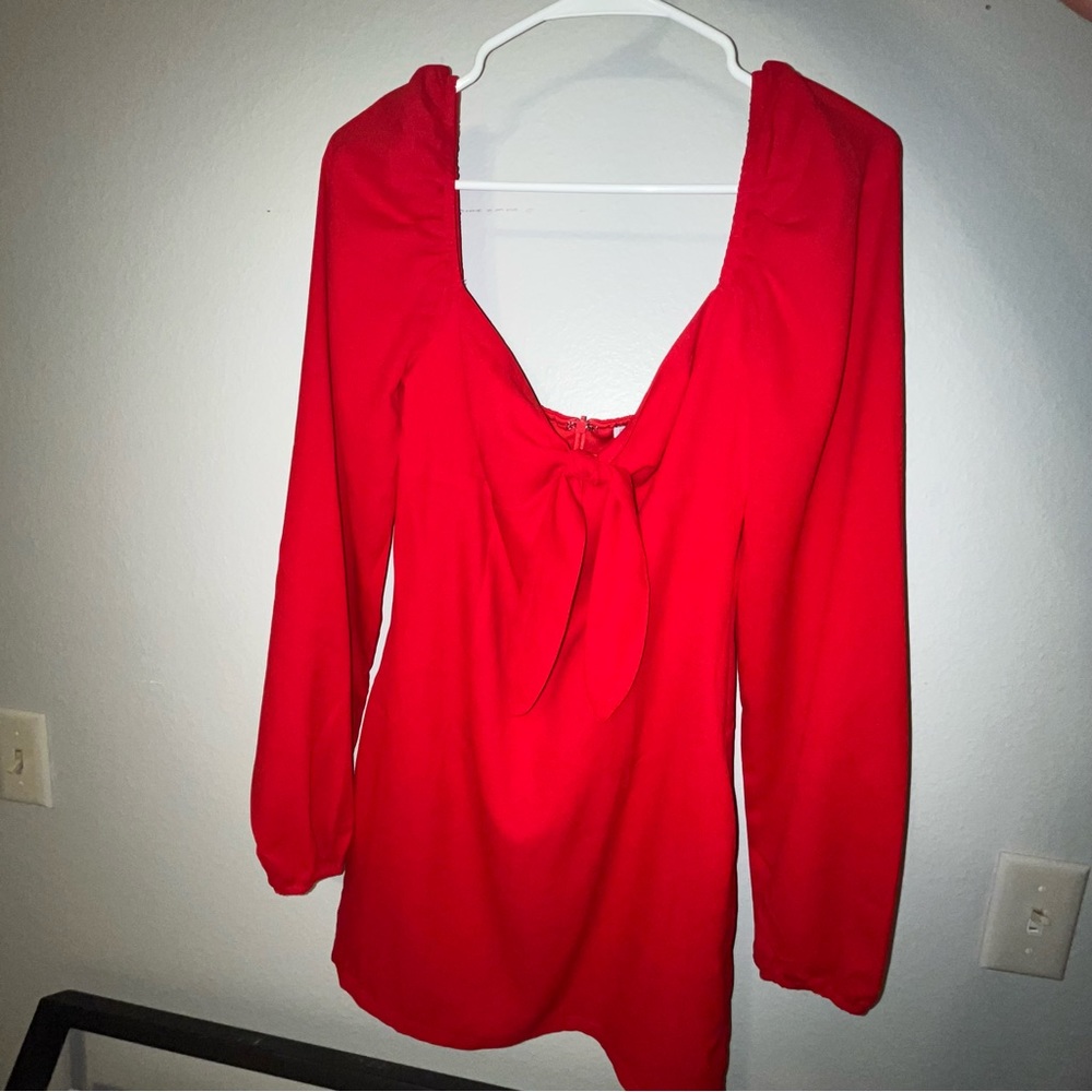 Long sleeve red bodycon mini dress.